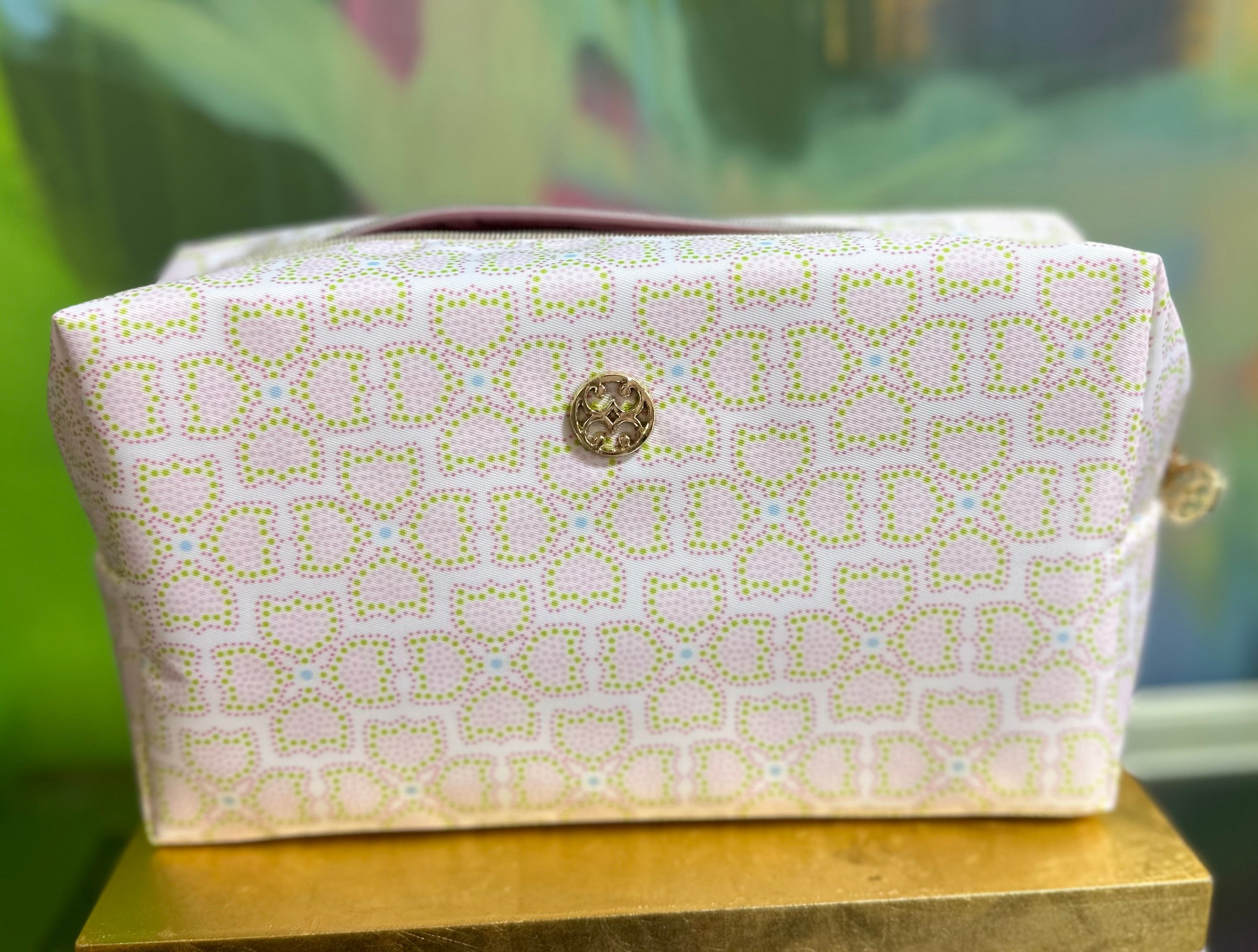 Pink and green travel makeup bag