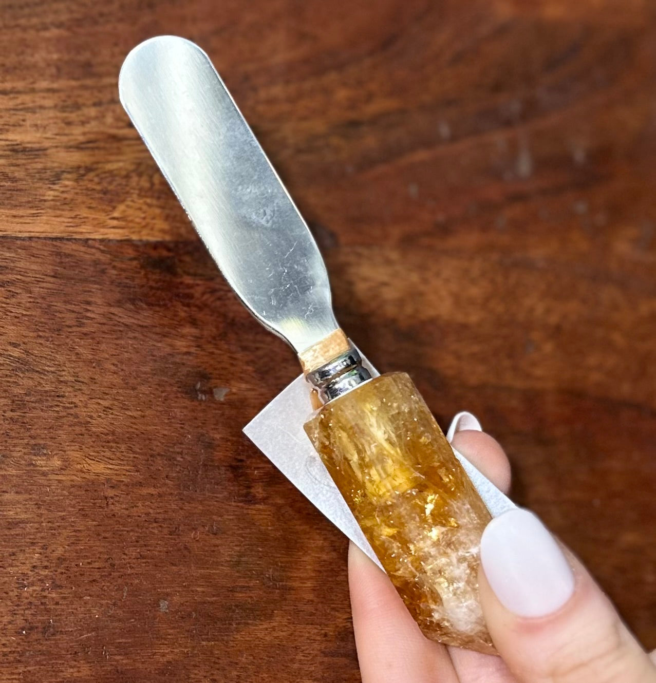 Bronze colored quartz handle cheese spreader